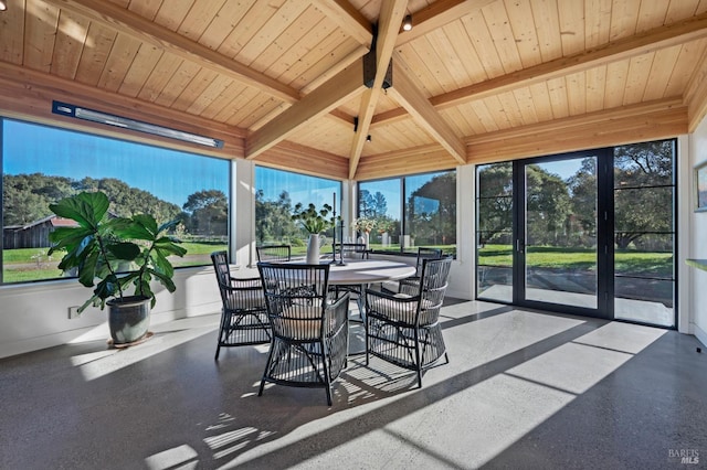 sunroom / solarium featuring outdoor dining space, beamed ceiling, baseboards, and wooden ceiling