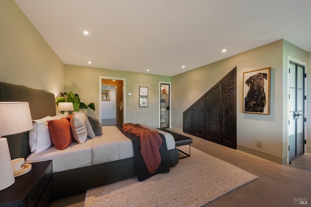 bedroom with recessed lighting and carpet flooring