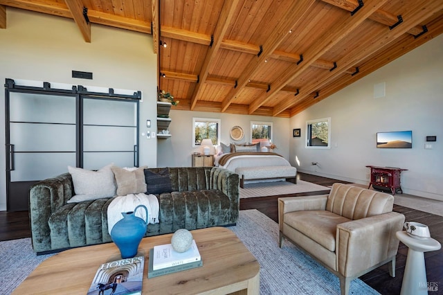 bedroom with high vaulted ceiling, wooden ceiling, wood finished floors, baseboards, and beam ceiling
