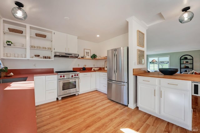 kitchen featuring stainless steel appliances, under cabinet range hood, light wood finished floors, and open shelves