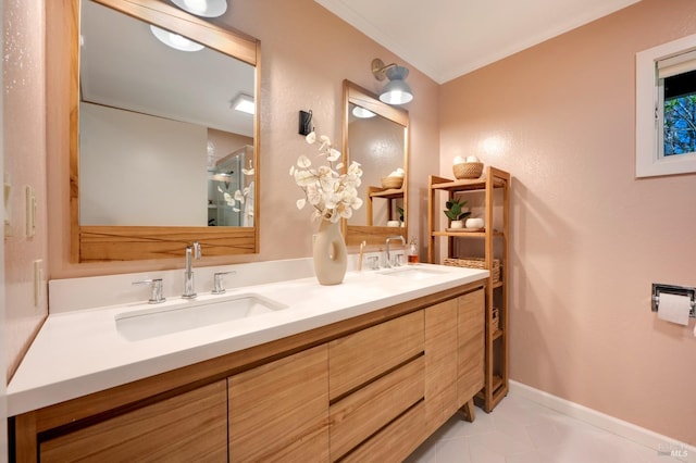 full bathroom featuring a sink, tile patterned floors, double vanity, and crown molding
