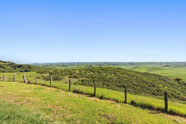 exterior space with a rural view