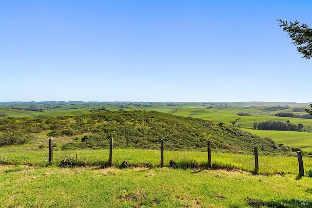 view of landscape with a rural view