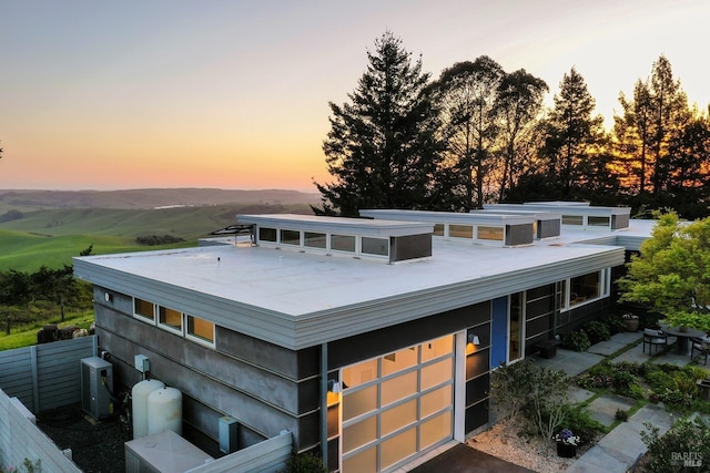 exterior space featuring central AC unit