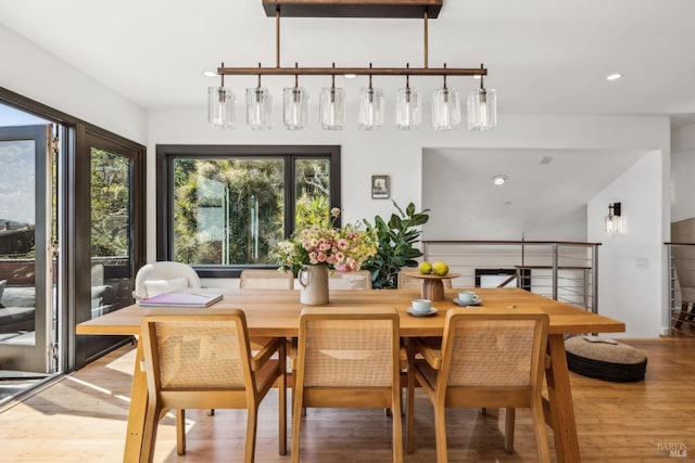 dining room featuring recessed lighting and wood finished floors
