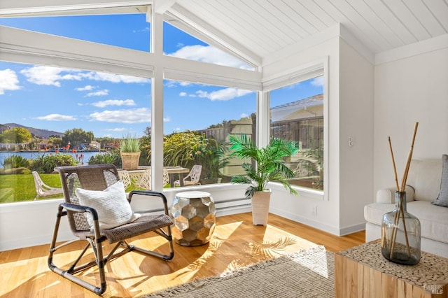 13 Leeward Rd, Belvedere, CA 94920 - sunroom / solarium featuring plenty of natural light, lofted ceiling, baseboards, and wood finished floors