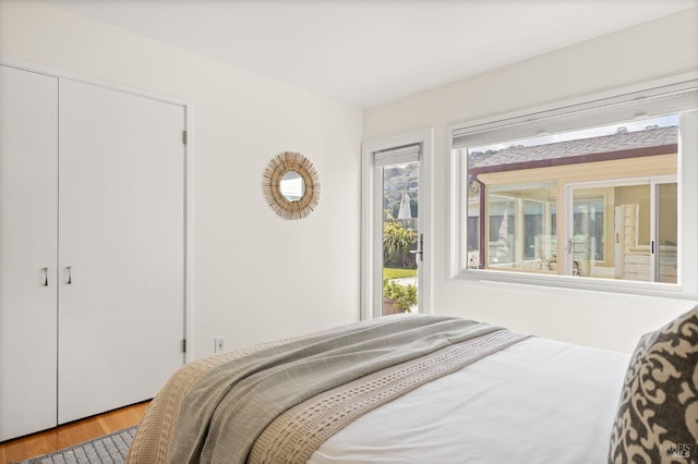 13 Leeward Rd, Belvedere, CA 94920 - bedroom featuring wood finished floors and a closet