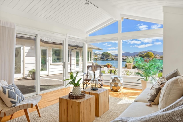 13 Leeward Rd, Belvedere, CA 94920 - sunroom featuring a water view, lofted ceiling with beams, and wood finished floors