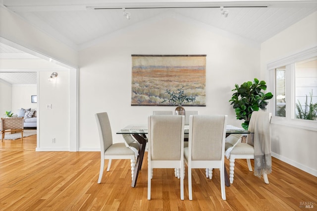 13 Leeward Rd, Belvedere, CA 94920 - dining area with wood finished floors, rail lighting, and lofted ceiling