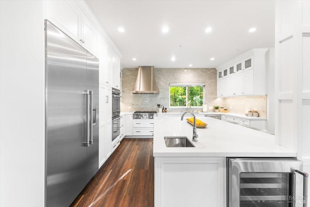 433 Tee Ct, Healdsburg, CA 95448 - kitchen with wall chimney range hood, light countertops, a sink, stainless steel appliances, and wine cooler