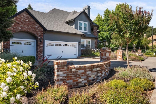 433 Tee Ct, Healdsburg, CA 95448 - craftsman house with a shingled roof, a garage, a chimney, brick siding, and driveway