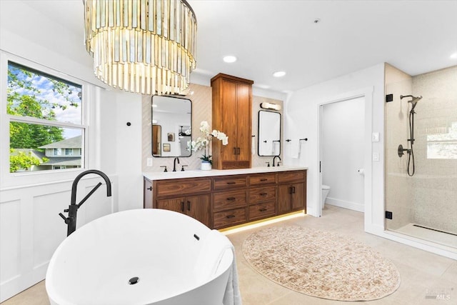 433 Tee Ct, Healdsburg, CA 95448 - bathroom with a freestanding tub, double vanity, a stall shower, toilet, and a sink