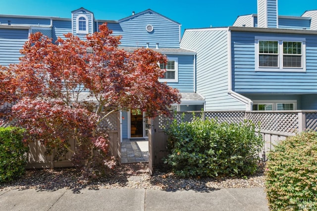 6600 Yount St Unit 40, Yountville, CA 94599 - view of side of property featuring a chimney and fence