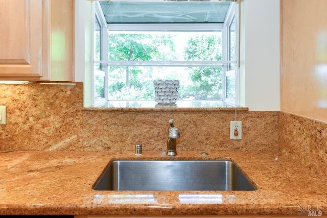 6600 Yount St Unit 40, Yountville, CA 94599 - interior details with a sink, tasteful backsplash, and light stone countertops
