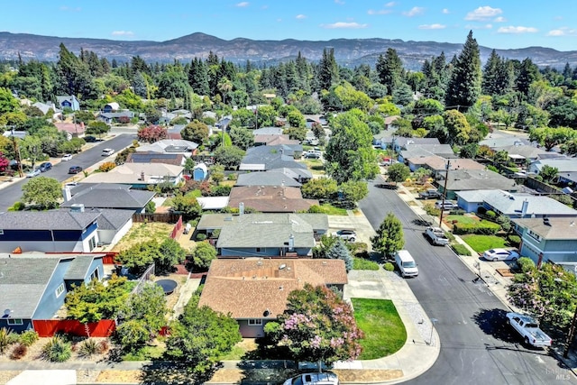 drone / aerial view with a mountain view and a residential view