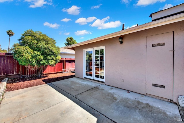 view of patio featuring fence