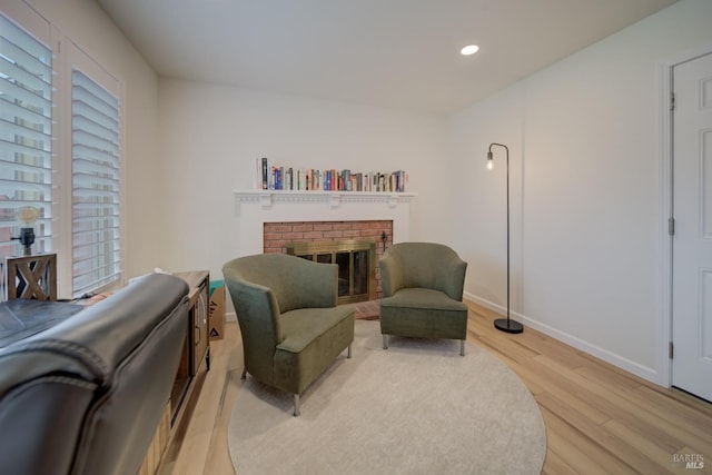 368 Lily St, Fairfield, CA 94533 - living area with light wood finished floors, recessed lighting, and a brick fireplace
