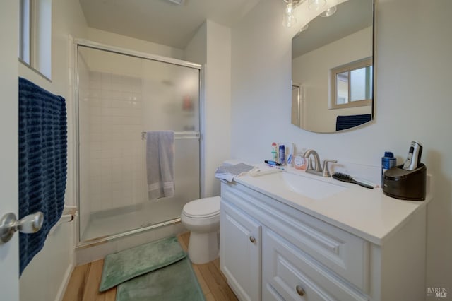 368 Lily St, Fairfield, CA 94533 - bathroom featuring a stall shower, vanity, and wood finished floors