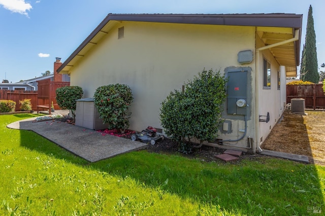 368 Lily St, Fairfield, CA 94533 - view of property exterior with stucco siding and a central AC unit