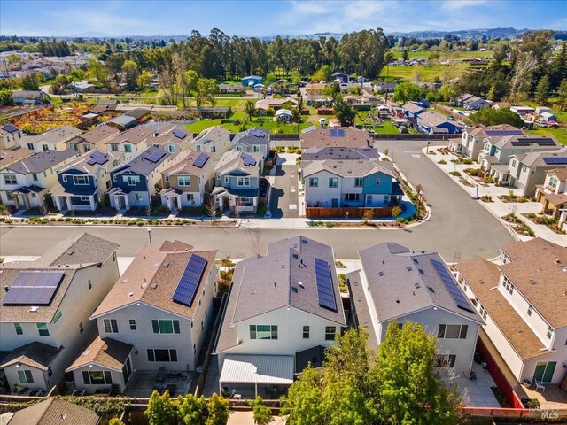 birds eye view of property with a residential view