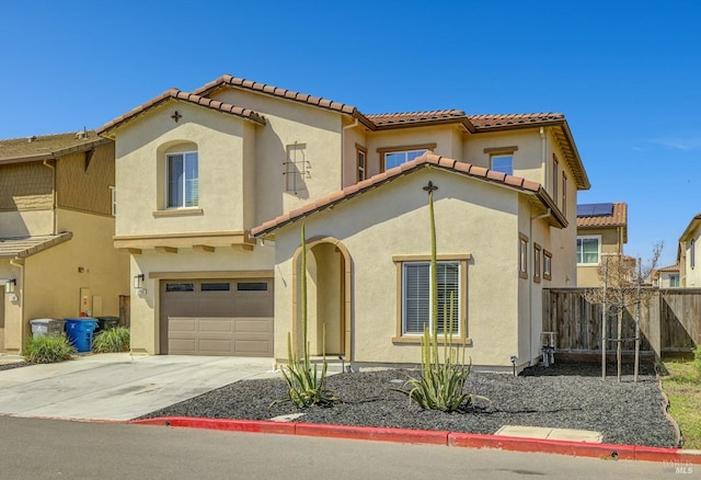 1090 Swarthmore Ct, Dixon, CA 95620 - mediterranean / spanish house with stucco siding, a garage, a tile roof, and concrete driveway