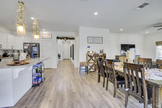 1090 Swarthmore Ct, Dixon, CA 95620 - dining room with light wood-style flooring, recessed lighting, baseboards, and ceiling fan
