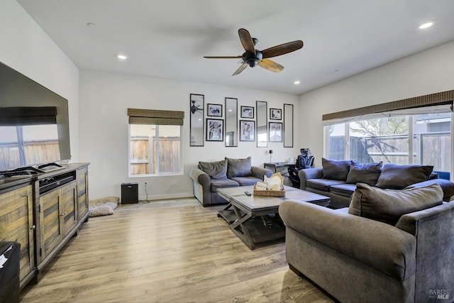 1090 Swarthmore Ct, Dixon, CA 95620 - living area with light wood-style floors, a ceiling fan, recessed lighting, and baseboards