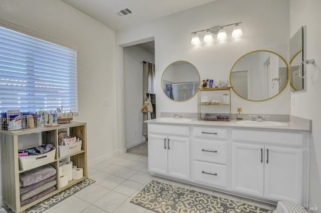 1090 Swarthmore Ct, Dixon, CA 95620 - bathroom with double vanity and tile patterned flooring
