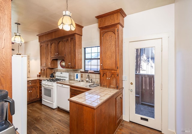 1436 Pine St, Napa, CA 94559 - kitchen with tile countertops, white appliances, dark wood-type flooring, a peninsula, and a sink