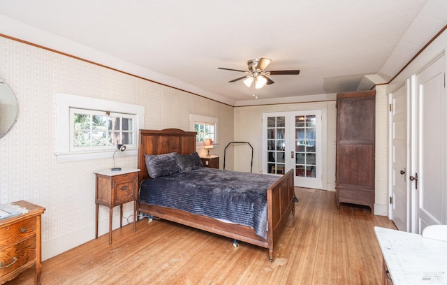 1436 Pine St, Napa, CA 94559 - bedroom featuring baseboards, a ceiling fan, light wood finished floors, wallpapered walls, and french doors
