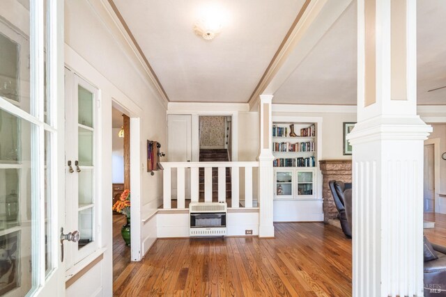 1436 Pine St, Napa, CA 94559 - corridor with decorative columns, ornamental molding, heating unit, and wood finished floors