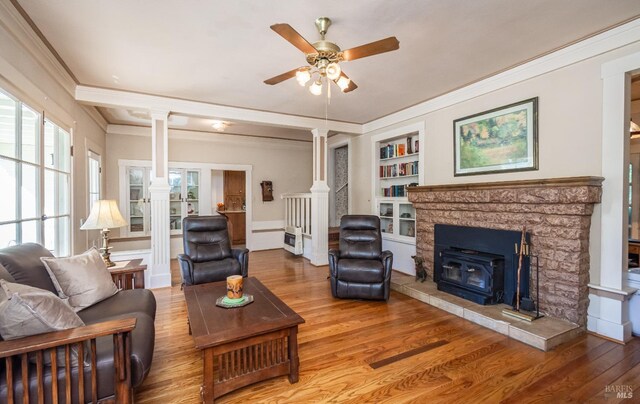 1436 Pine St, Napa, CA 94559 - living area featuring ornate columns, crown molding, a ceiling fan, and wood finished floors