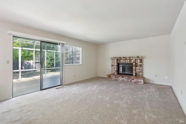 220 Sandy Neck Way, Vallejo, CA 94591 - unfurnished living room with carpet floors, a brick fireplace, and baseboards