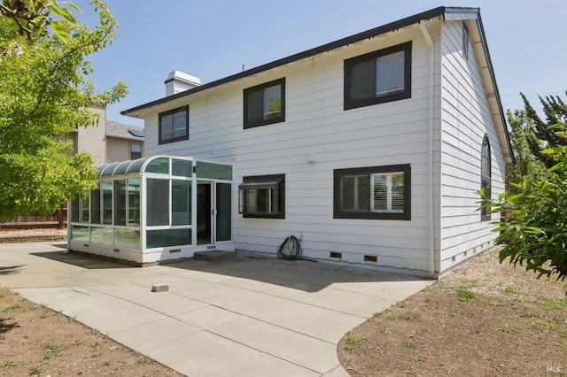 220 Sandy Neck Way, Vallejo, CA 94591 - rear view of house with a sunroom, crawl space, a patio, and a chimney