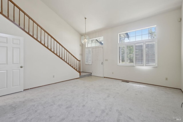 220 Sandy Neck Way, Vallejo, CA 94591 - entrance foyer with a chandelier, carpet, stairway, and baseboards