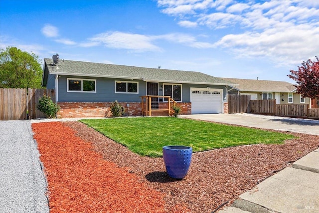 single story home with brick siding, fence, a garage, and driveway