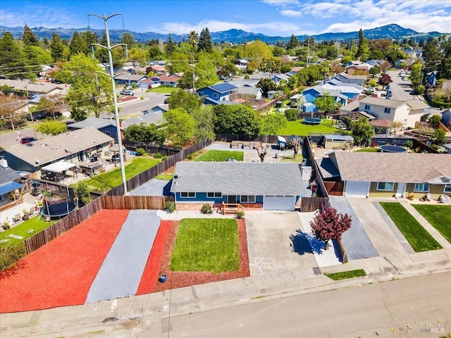aerial view featuring a mountain view and a residential view