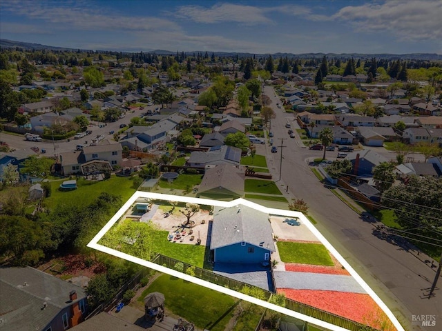 birds eye view of property with a residential view
