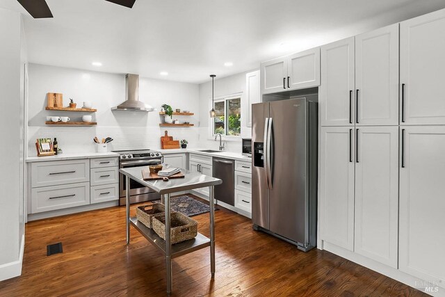 436 Calle De La Mesa, Novato, CA 94949 - kitchen with stainless steel appliances, open shelves, wall chimney range hood, tasteful backsplash, and a sink