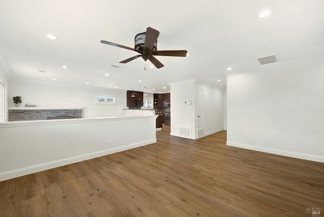 unfurnished living room featuring recessed lighting, visible vents, a ceiling fan, and wood finished floors