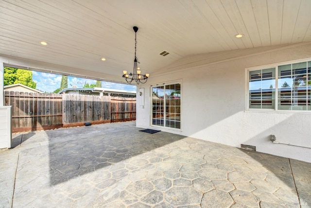 view of patio / terrace with visible vents and fence
