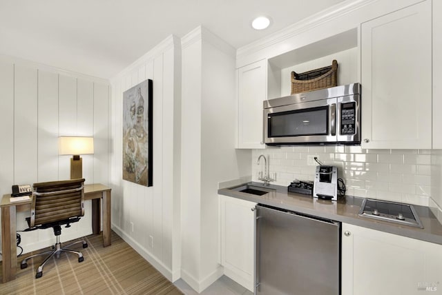 1600 Atlas Peak Rd Unit 286, Napa, CA 94558 - interior space with stainless steel microwave, refrigerator, white cabinetry, decorative backsplash, and a sink