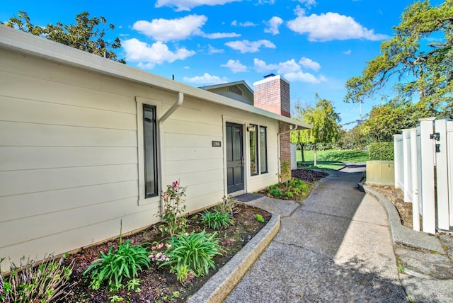 1600 Atlas Peak Rd Unit 286, Napa, CA 94558 - view of side of property with fence and a chimney