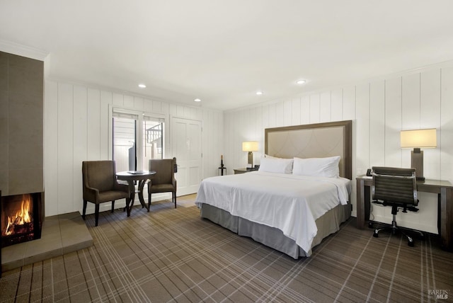 1600 Atlas Peak Rd Unit 286, Napa, CA 94558 - bedroom with dark colored carpet, a tiled fireplace, and recessed lighting