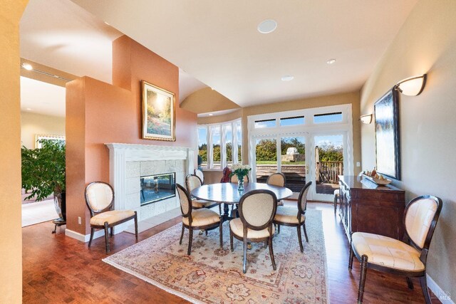 2614 Scotts Right Of Way, Sebastopol, CA 95472 - dining room with arched walkways, wood finished floors, and a fireplace