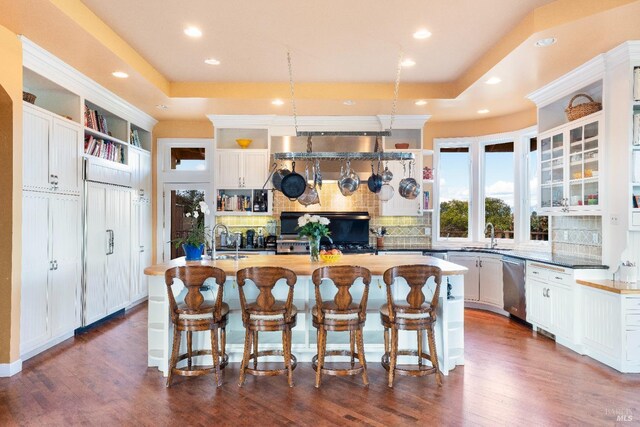 2614 Scotts Right Of Way, Sebastopol, CA 95472 - kitchen featuring open shelves, decorative backsplash, white cabinetry, wall chimney range hood, and recessed lighting