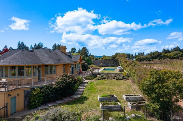 2614 Scotts Right Of Way, Sebastopol, CA 95472 - view of grassy yard featuring a garden and a deck