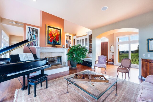 2614 Scotts Right Of Way, Sebastopol, CA 95472 - dining area with arched walkways, wood finished floors, a ceiling fan, recessed lighting, and a towering ceiling