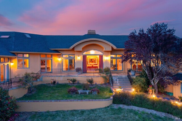 2614 Scotts Right Of Way, Sebastopol, CA 95472 - view of front of home with stucco siding, roof with shingles, and stairway