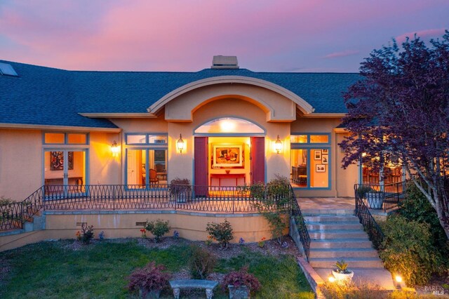 2614 Scotts Right Of Way, Sebastopol, CA 95472 - view of front of house with a chimney, stucco siding, a garage, and a lawn